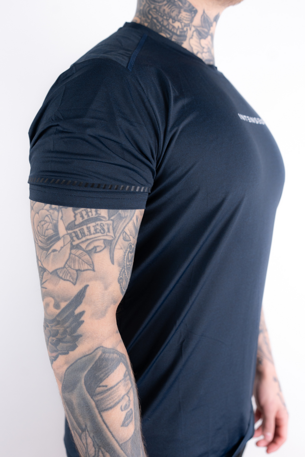 Intensed miesten tekninen t-paita, joustava mukava tumman sininen hengittävä joka sopii koviin treeneihin
